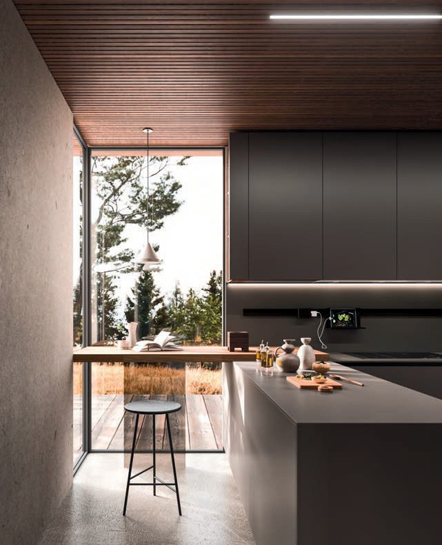 Cuisine sur mesure avec îlot central, assises et ouverture sur le jardin